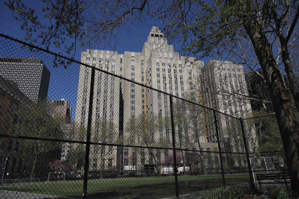 An exterior view of Manhattan Criminal Court during the second day of the trial of former US President Donald Trump for allegedly covering up hush money payments linked to extramarital affairs in New York City on April 16, 2024. — AFP pic