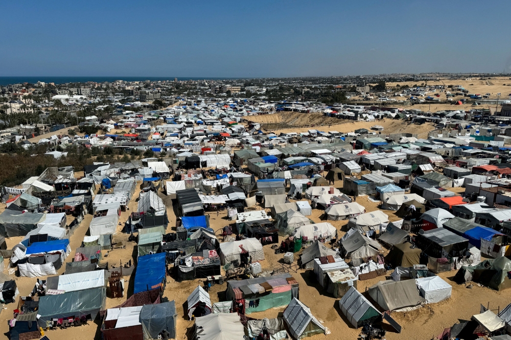 Displaced Palestinians, who fled their houses due to Israeli strikes, shelter in a tent camp, amid the ongoing conflict between Israel and the Palestinian Islamist group Hamas, in Rafah, in the southern Gaza Strip March 11, 2024. — Reuters file pic