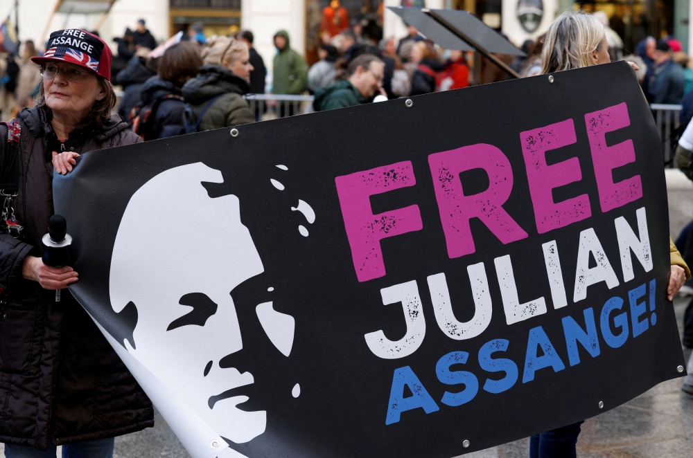 Supporters of WikiLeaks founder Julian Assange protest on the day he appeals in a British court against his extradition to the United States, in Vienna, Austria February 20, 2024. — Reuters file pic