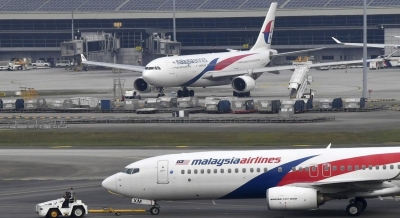 由于印度尼西亚鲁昂火山喷发，马来西亚航空今天取消了吉隆坡国际机场和沙巴、砂拉越之间的航班