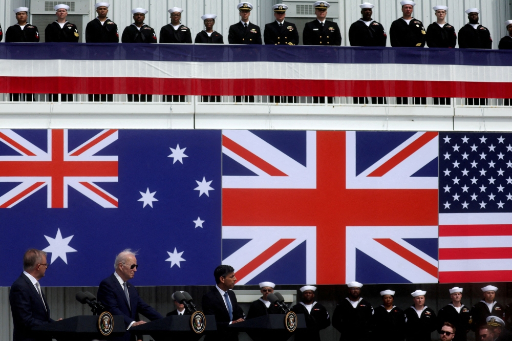 File photo of US President Joe Biden, Australian Prime Minister Anthony Albanese and British Prime Minister Rishi Sunak delivering remarks on the Australia - United Kingdom - U.S. (AUKUS) partnership, after a trilateral meeting, at Naval Base Point Loma in San Diego, California US March 13, 2023. ― Reuters pic