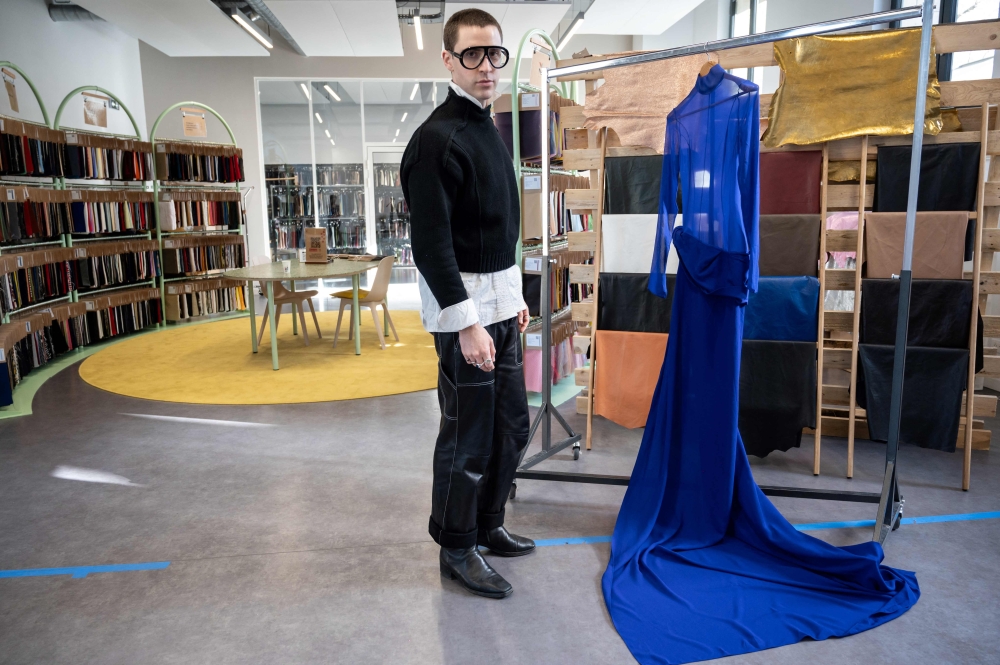 Spanish designer Arturo Obegero poses in the Nona Source showroom, reselling materials from the LVMH Group's Fashion and Leather Goods companies, in Paris March 14, 2024. — AFP pic