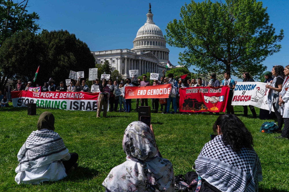 Pro-Palestinian protesters gather near the US Capitol on April 20, 2024 in Washington, DC as lawmakers passed a US$95 billion foreign aid package today for Israel, as well as Ukraine and Taiwan. — AFP pic
