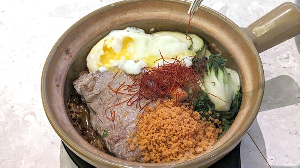 The Wonder beef pot rice has an irresistible beef fat crumb.