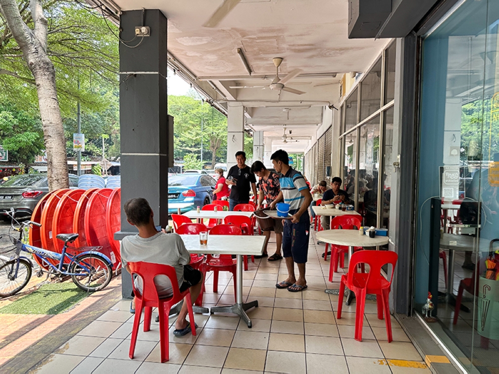 Seating is available inside the restaurant and also on the five foot way at nearby shoplots