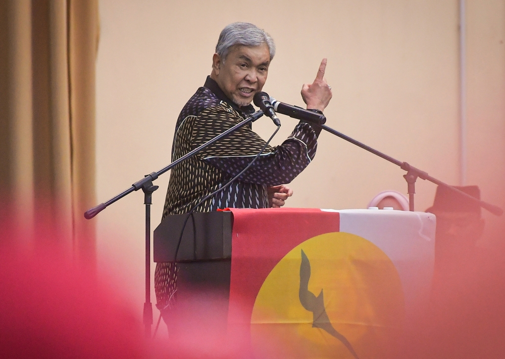 Deputy Prime Minister and Umno president Datuk Seri Ahmad Zahid Hamidi speaks at the official launch of Umno branch meetings in Hulu Selangor April 21, 2024. — Bernama pic