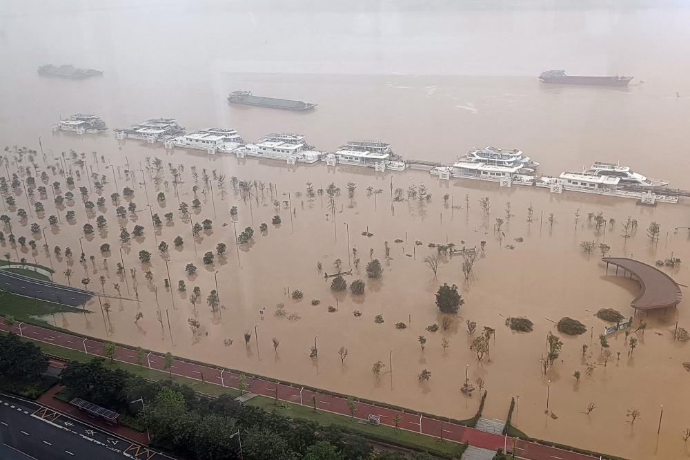 A general view of a submerged street after heavy rains in Qingyuan City, in southern Guangdong province. — AFP pic