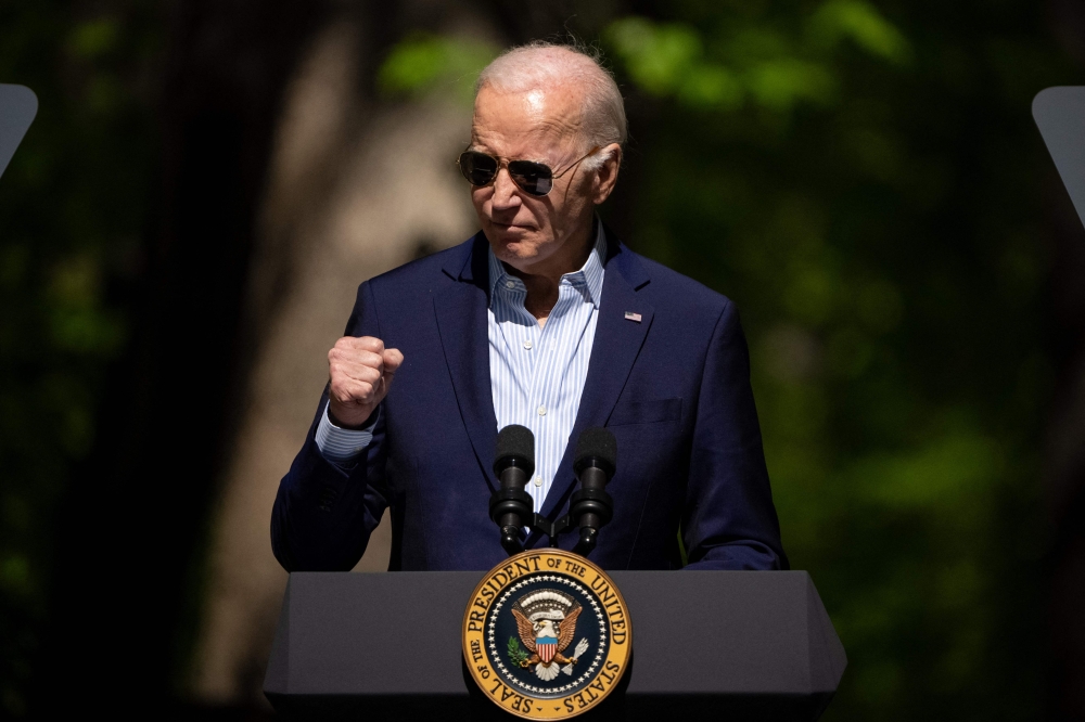 US President Joe Biden said the United States will 'quickly provide significant new security assistance packages to meet Ukraine’s urgent battlefield and air defence needs'. — AFP pic