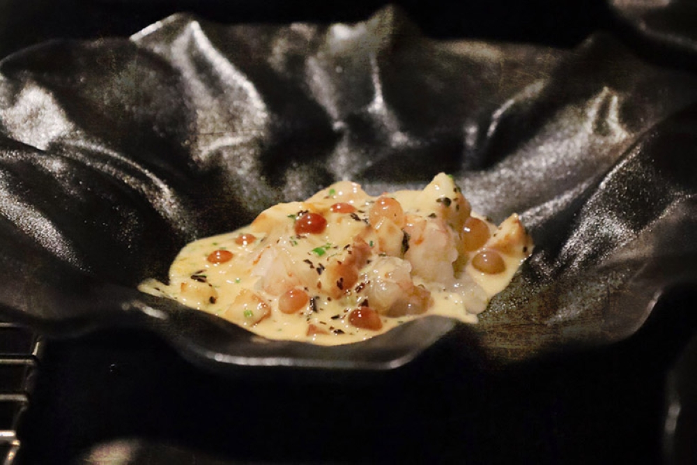 Drunken Prawn features 'akaebi' (Argentine red shrimp), Huadiao butter sauce, braised squid and 'ikura'.