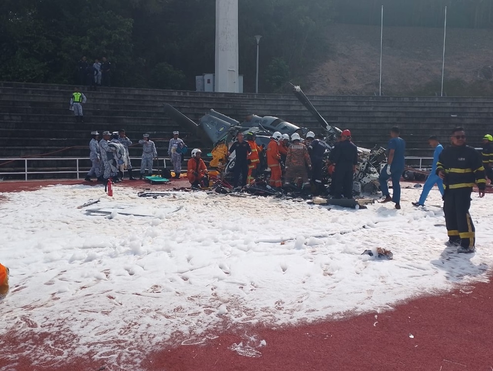 Rescue personnel are seen at the site of the crash. ― Picture via Facebook/Jabatan Bomba dan Penyelamat Malaysia