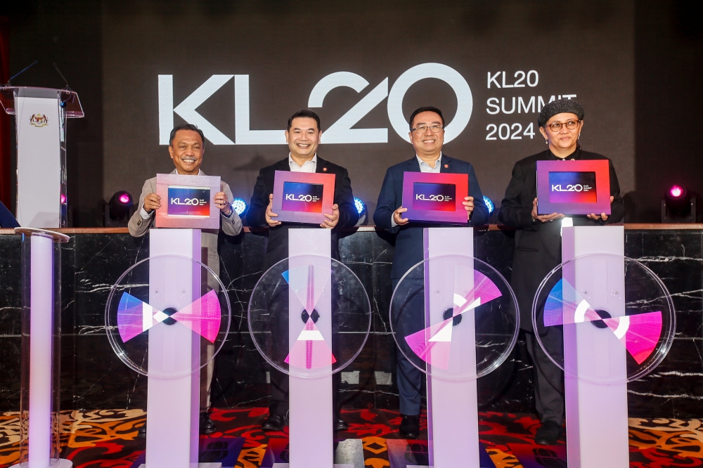 Economy Minister Rafizi Ramli (second left) and Science, Technology and Innovation Minister Chang Lih Kang (second right) during the launch of Majlis PraPeluncuran Acara Perdana KL20 at Parlimen Malaysia March 27, 2024. - Picture by Hari Anggara.