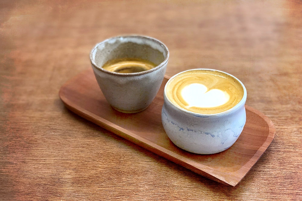 The 'Barista’s Breakfast' – an espresso and a flat white.