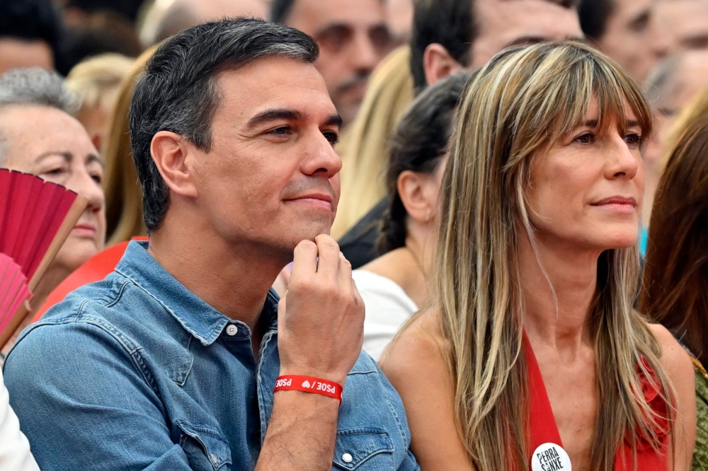 Spanish Prime Minister Pedro Sanchez said yesterday he was weighing the possibility of resigning after a court opened an investigation into his wife Begona Gomez on suspicion of graft. — AFP pic