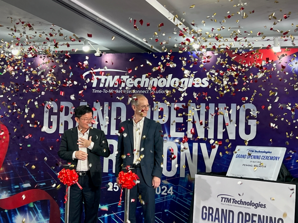 TTM Technologies president Thomas Edman and Penang Chief Minister Chow Kon Yeow at the official opening of its first large-scale plant in Southeast Asia. — Picture by Opalyn Mok