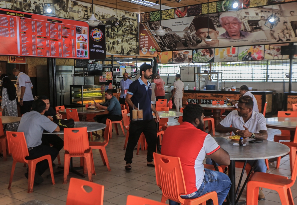 Forcibly reducing the operating hours for eateries is not only detrimental to Malaysia's investment climate but also contrary to our goal of promoting tourism development. ― Picture by Farhan Najib