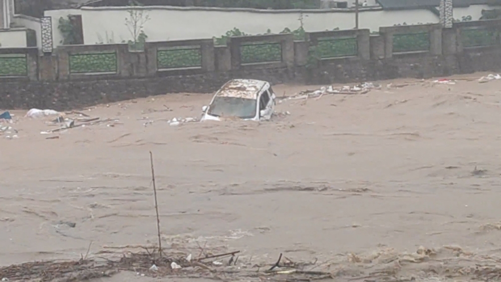 A vehicle is swept by the floodwaters following heavy rainfall in Jiangwan, Guangdong, China in this screengrab taken from a social media video released on April 22, 2024. — Screenshot from video obtained by Reuters