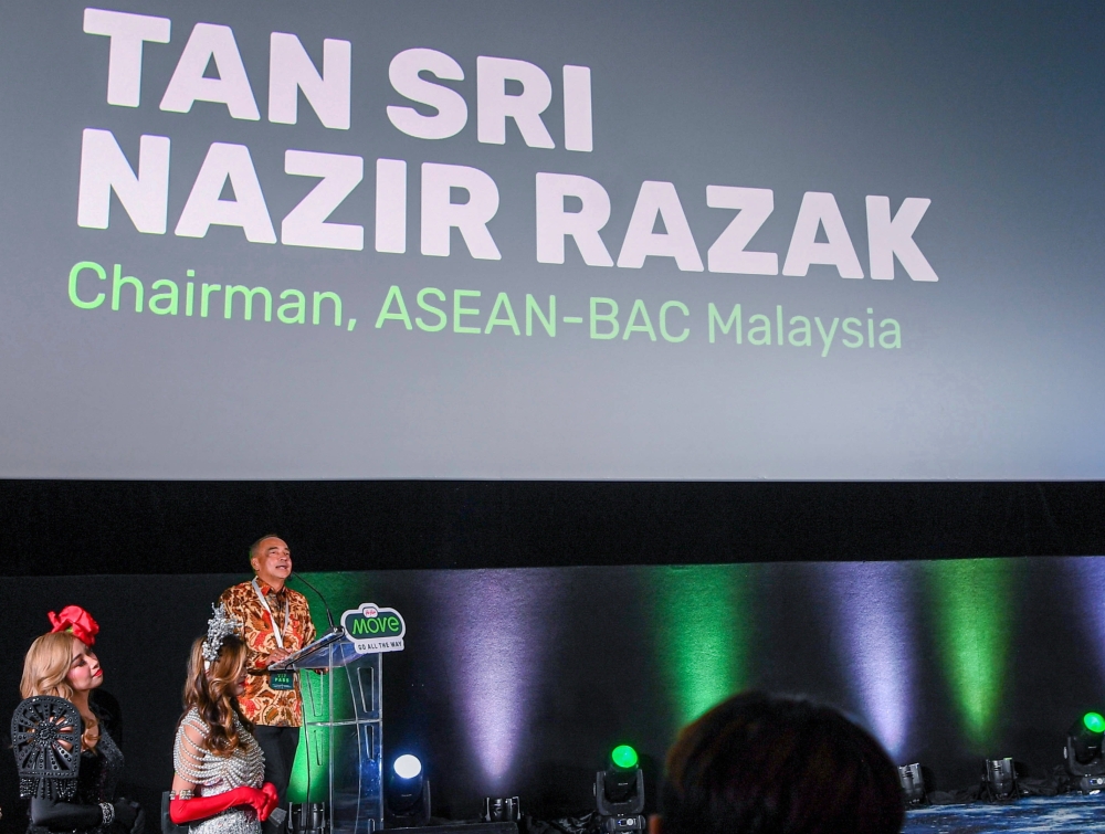 Asean Business Advisory Council chairman Tan Sri Nazir Razak delivers his opening remarks during the launch of AirAsia Move’s Asean Explorer Pass at Dadi Cinema, Pavilion Kuala Lumpur April 25, 2024. — Bernama pic
