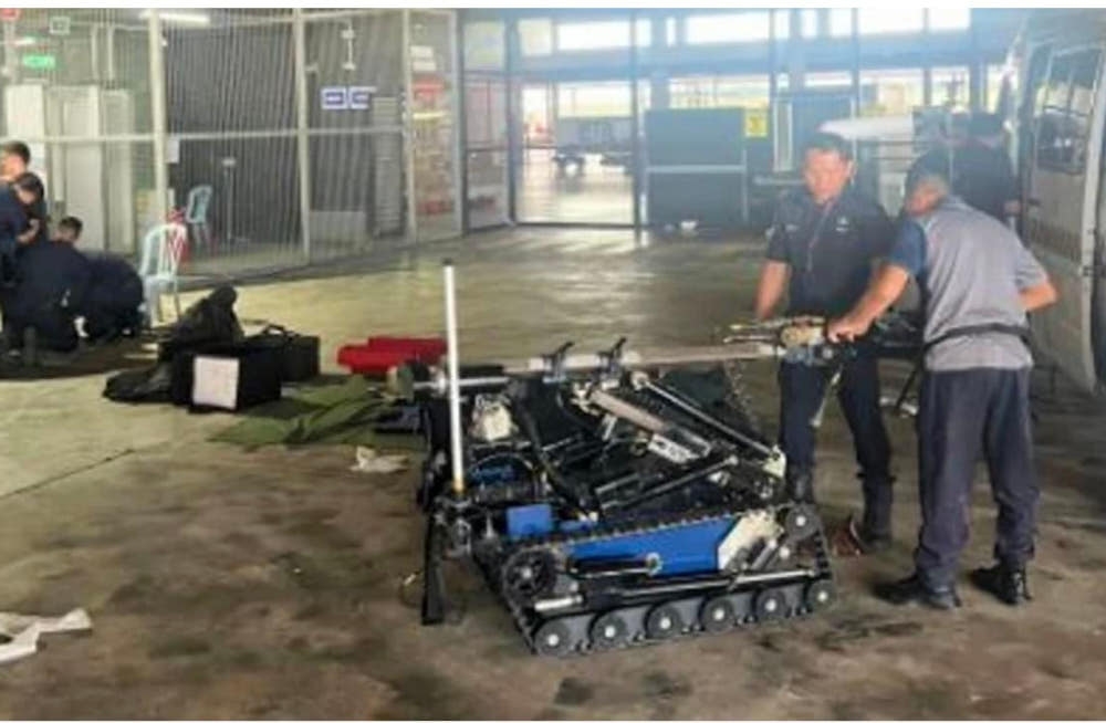 Police conduct an investigation at KLIA Cargo centre following claims that a package containing a bomb was discovered. — Picture courtesy of KLIA Police