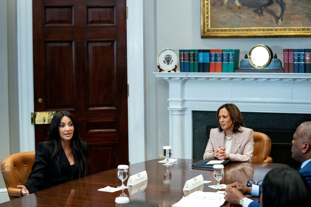 US Vice President Kamala Harris hosted reality-television star Kim Kardashian at the White House yesterday to discuss criminal justice reform, after the Biden administration granted clemency to people convicted of nonviolent drug offenses. — Reuters pic