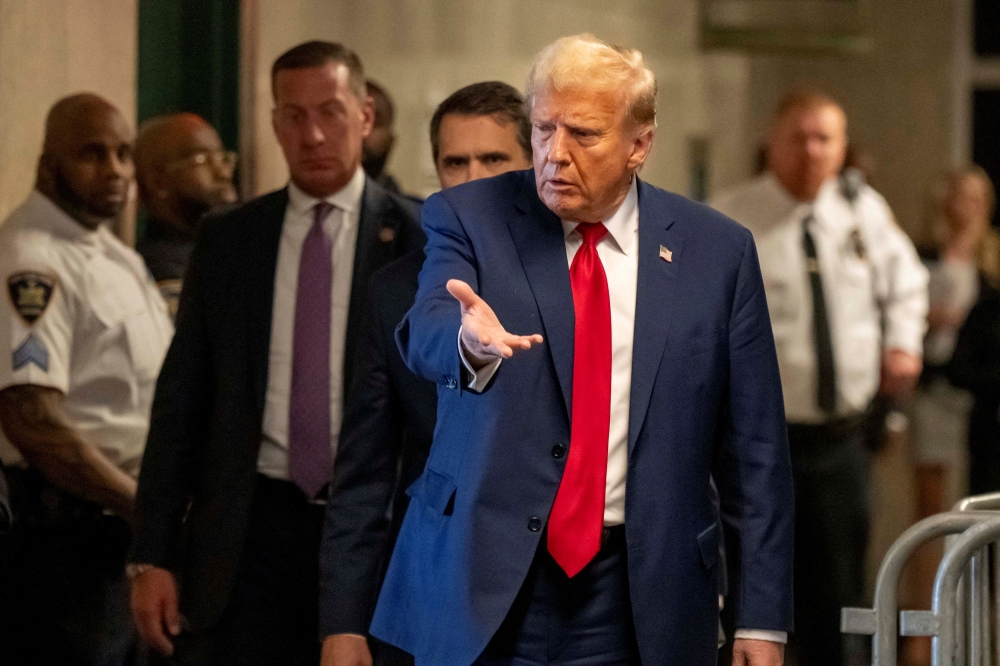 During arguments before the US Supreme Court on Donald Trump’s claim of presidential immunity from prosecution, two starkly different views of the consequences were on display yesterday. — Reuters pic