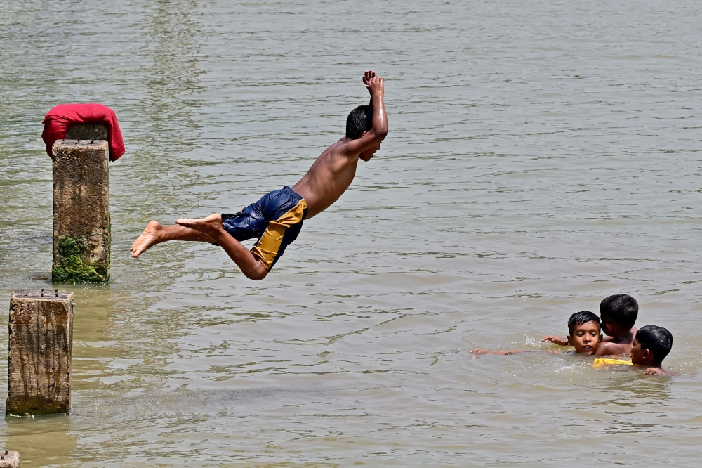 Classes are cancelled across Bangladesh due to searing heat. — AFP pic