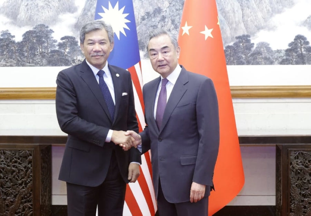 Foreign Minister Datuk Seri Mohamad Hasan with his counterpart, Wang Yi, in Beijing, April 25, 2024. — Picture courtesy of Wisma Putra 
