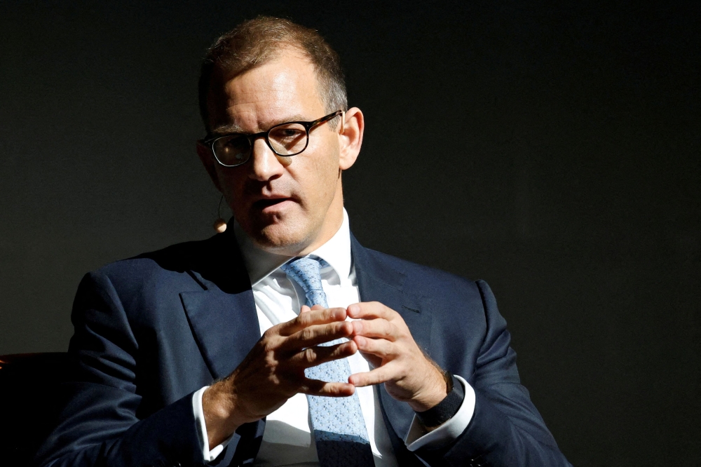 Czech businessman Daniel Kretinsky speaks at a conference in Prague October 17, 2023. — Reuters pic  