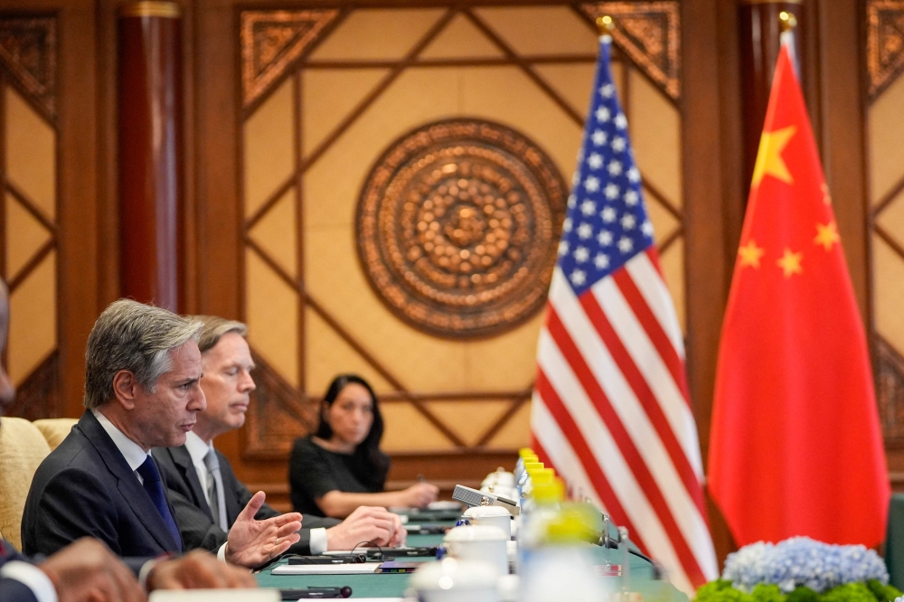 US Secretary of State Antony Blinken (left) gestures as he holds talks with China's Minister of Public Security Wang Xiaohong (not pictured) at the Diaoyutai State Guesthouse in Beijing April 26, 2024. — Mark Schiefelbein/Pool/AFP pic 