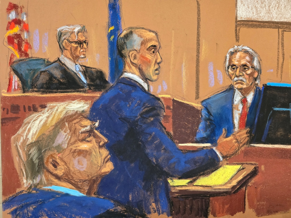 David Pecker is cross examined by Emil Bove during former U.S. President Donald Trump's criminal trial on charges that he falsified business records to conceal money paid to silence porn star Stormy Daniels in 2016, in Manhattan state court in New York City April 26, 2024 in this courtroom sketch. — Reuters pic