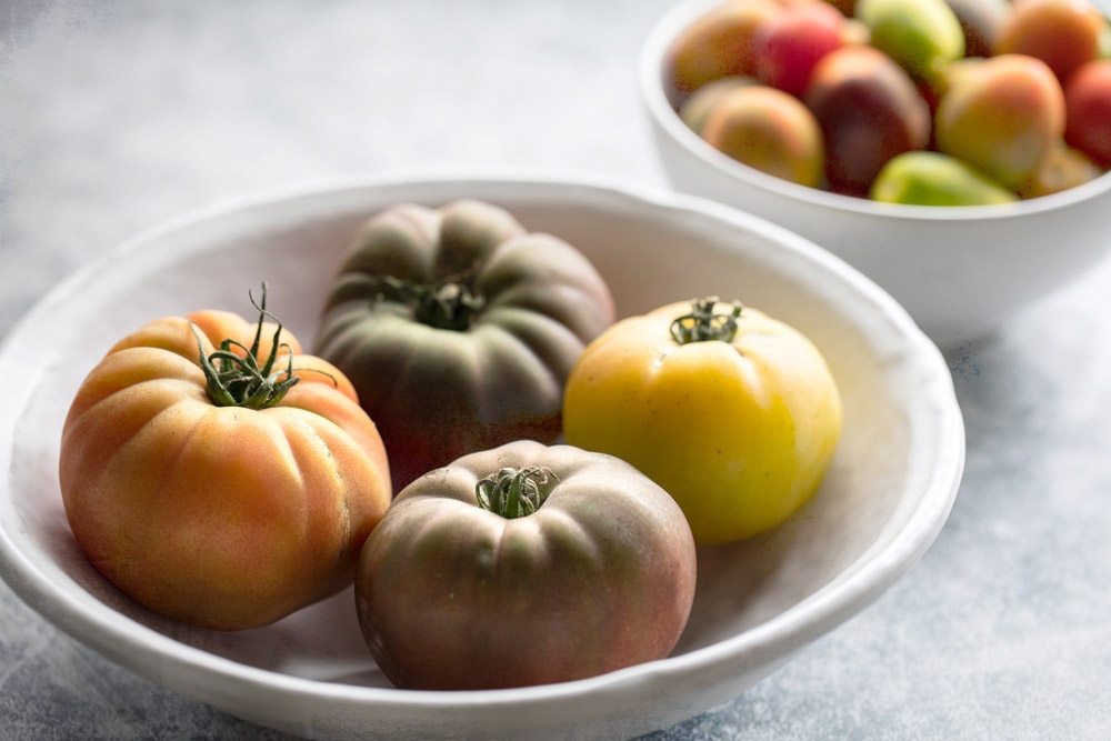 Heirloom beefsteak tomatoes have more ridges than the classic smooth variety.