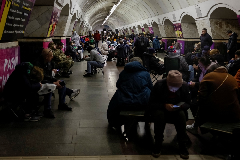 People take shelter inside a metro station during a Russian missile strike, amid Russia's attacks on Ukraine, in Kyiv, Ukraine, April 27, 2024. — Reuters pic