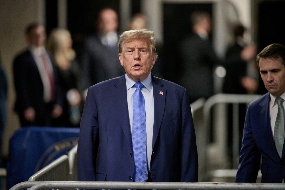 File photo of former US President Donald Trump speaking to members of the media at Manhattan criminal court in New York, US, on Friday, April 26, 2024. — Reuters pic