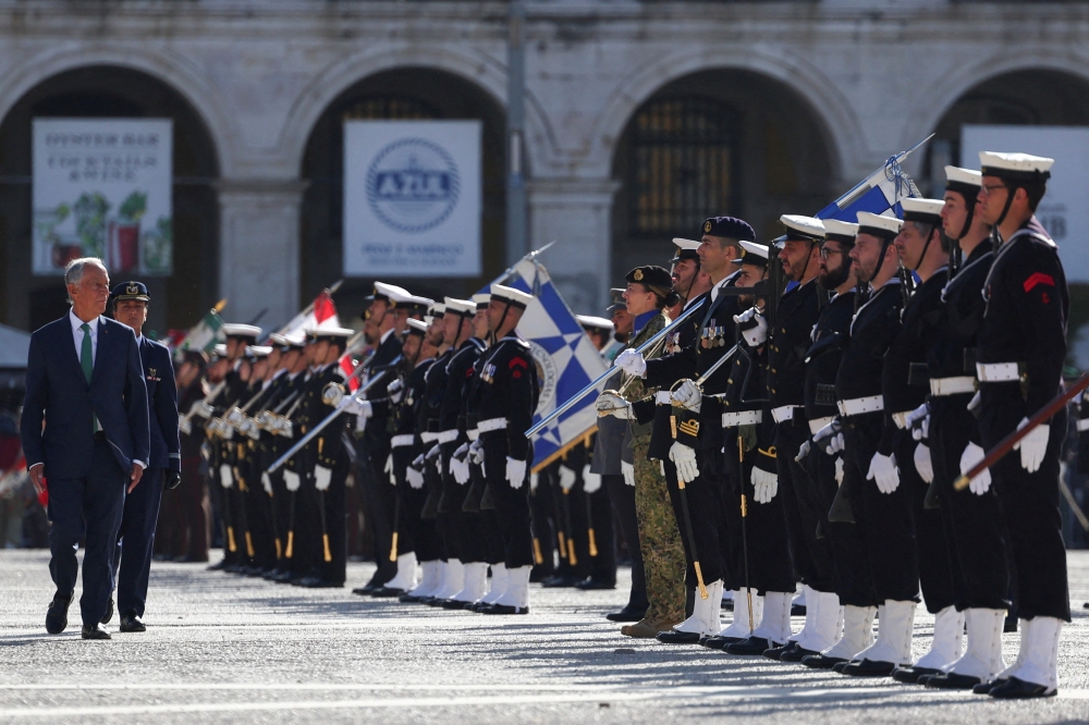 Portuguese President Marcelo Rebelo de Sousa reviews the military during a ceremony commemorating the 50th anniversary of Portugal’s Carnation Revolution that resulted in the overthrow of the dictatorship and transition to democracy, in Lisbon, Portugal April 25, 2024. — Reuters pic 