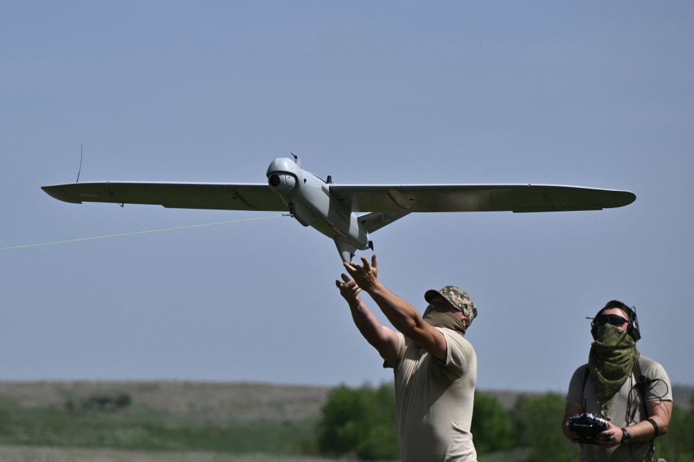 Ukrainian servicemen of the 22nd Brigade launch a Leleka reconnaissance UAV drone near Chasiv Yar, Donetsk region, on April 27, 2024, amid the Russian invasion of Ukraine. — AFP pic 