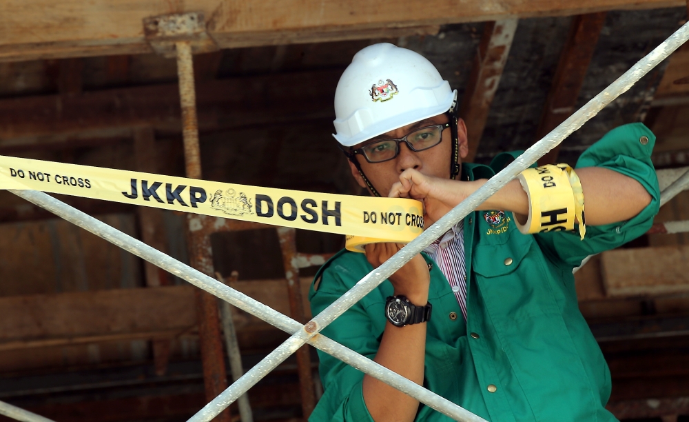 The original Occupational Safety and Health Act of 1994 (OSHA 1994), is the primary law governing occupational safety and health in Malaysia. — Picture by Farhan Najib