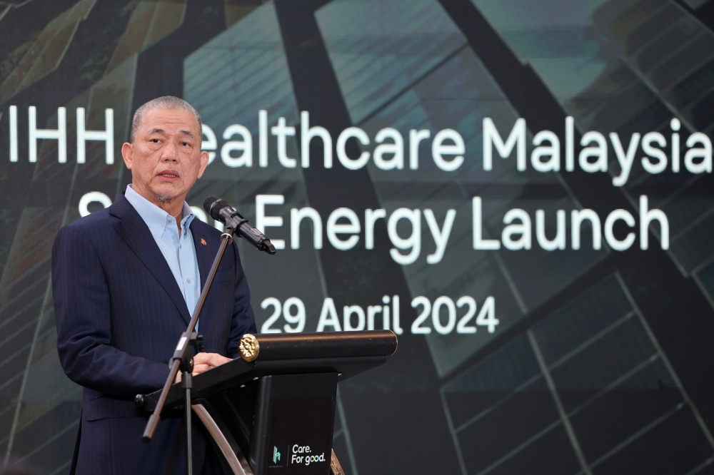 Deputy Prime Minister Datuk Seri Fadillah Yusof delivers a speech during the launching of the solar power generation system for facilities under IHH Healthcare Malaysia at the Prince Court Medical Centre, in Kuala Lumpur April 29, 2024. — Bernama pic