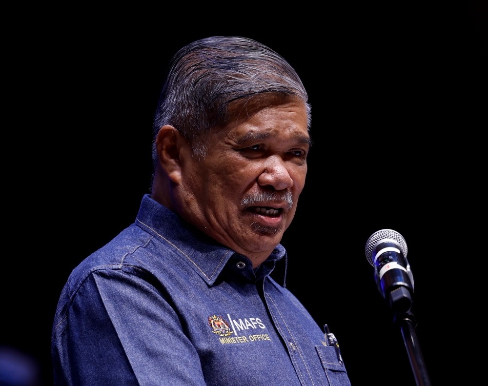 Minister of Agriculture and Food Security Datuk Seri Mohamad Sabu delivers a speech at the the Agriculture Department’s 2024 Plant Subsector Development Symposium in Klang April 29, 2024. — Bernama pic