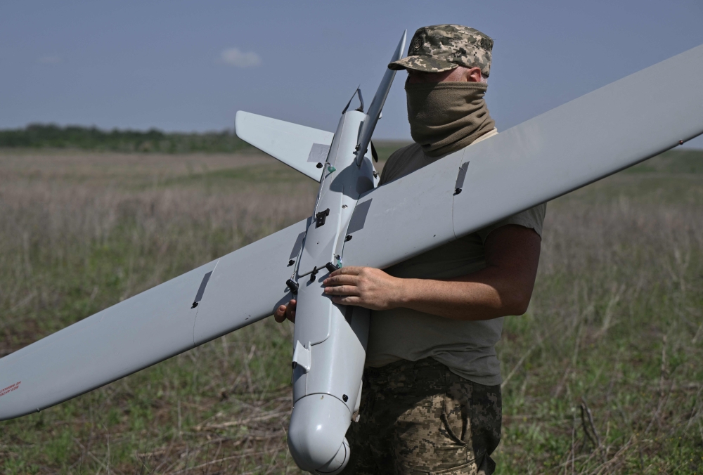 A Ukrainian serviceman of the 22nd Brigade prepares to fly a Leleka reconnaissance UAV drone near Chasiv Yar, Donetsk region, on April 27, 2024, amid the Russian invasion of Ukraine. — AFP pic