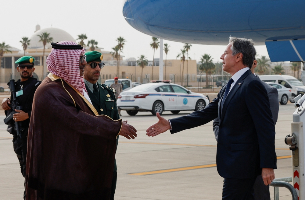 US Secretary of State Antony Blinken is welcomed by Saudi Ministry of Foreign Affairs Director of Protocol Affairs Mohammed Al-Ghamdi as he visits Saudi Arabia in the latest Gaza diplomacy push, in Riyadh April 29, 2024. — Reuters pic  