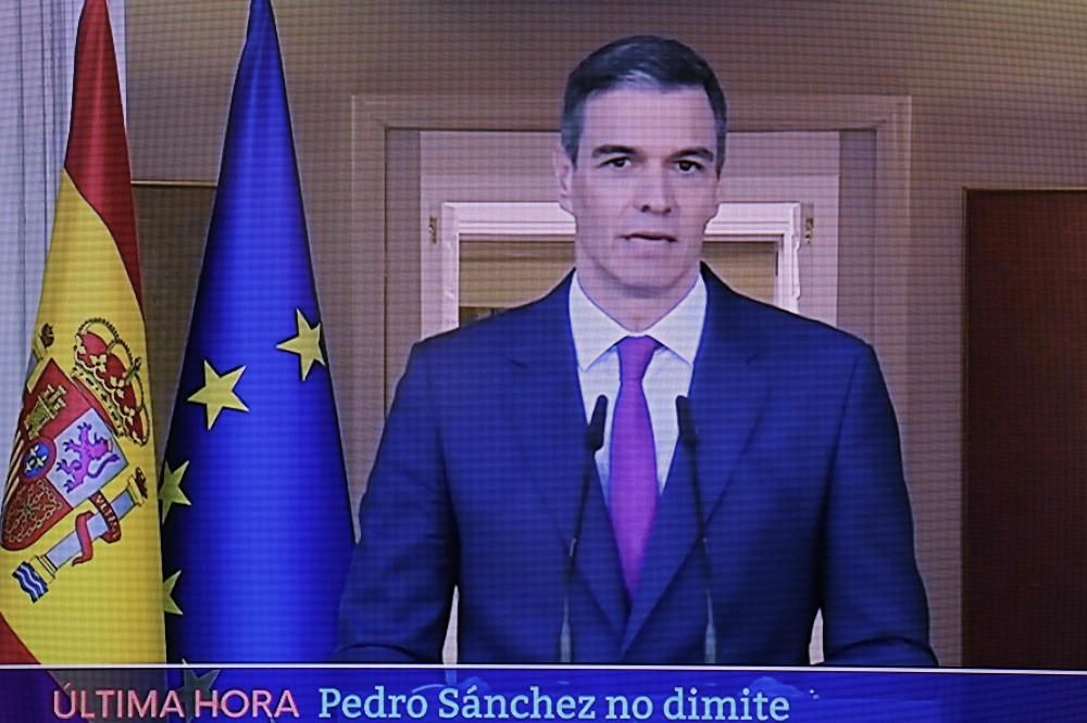 A picture of a TV screen taken on April 29, 2024 in Madrid shows Spain Prime Minister announcing that he stays as Prime Minister on despite political harassment. Pedro Sanchez said he would stay on as prime minister after threatening to stand down over what he has denounced as a campaign of political harassment by the right. — AFP pic