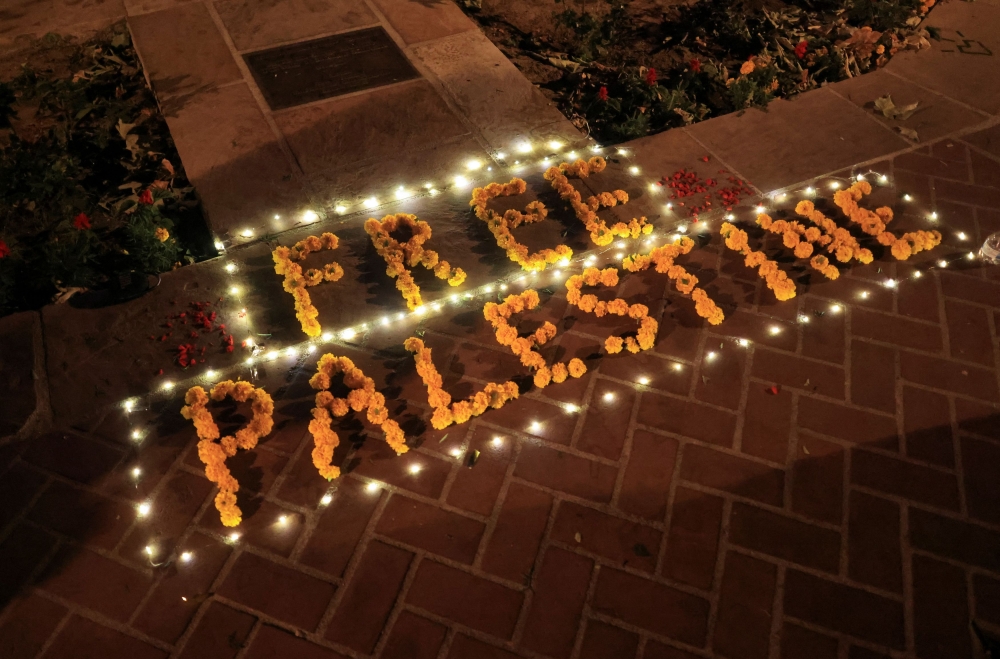 A flower arrangement that reads ‘Free Palestine’ is placed on the ground during a protest in support of Palestinians in Gaza at the University of Southern California (USC), amid the ongoing conflict between Israel and the Palestinian Islamist group Hamas, in Los Angeles April 27, 2024. — Reuters pic  