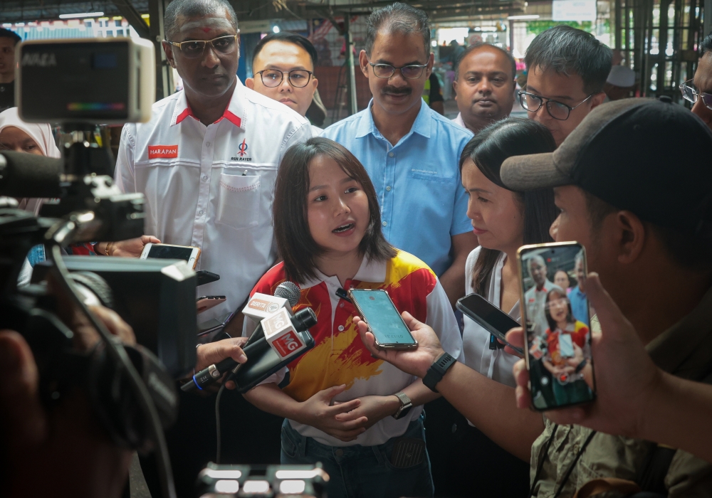 Pakatan Harapan’s candidate for the Kuala Kubu Baru by-election, Pang Sock Tao (centre), during a press conference in Hulu Selangor April 30, 2024. — Bernama pic