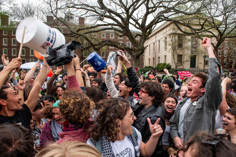 Brown University yesterday reached an agreement with students protesting the war in Gaza that would see them remove their encampment from school grounds in exchange for the institution considering divesting from Israel. — AFP pic