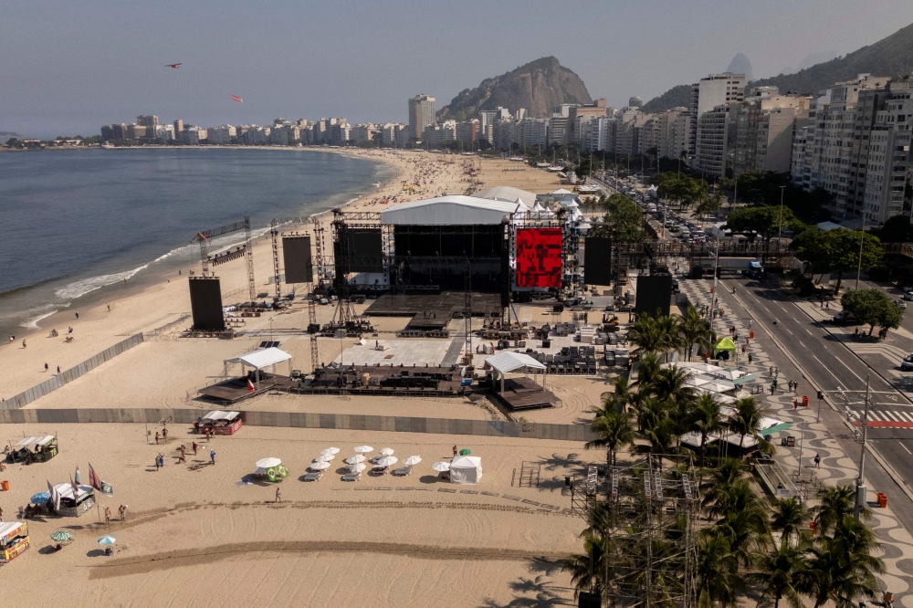 An aerial view of the Copacabana beach where Madonna’s free concert is being set up in Rio de Janeiro. — AFP pic