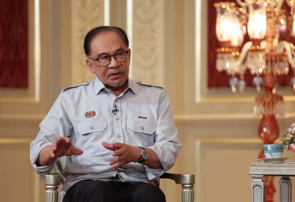 Prime Minister Datuk Seri Anwar Ibrahim answers questions during an interview with four local television channels, at Seri Perdana, May 1, 2024. — Bernama pic 