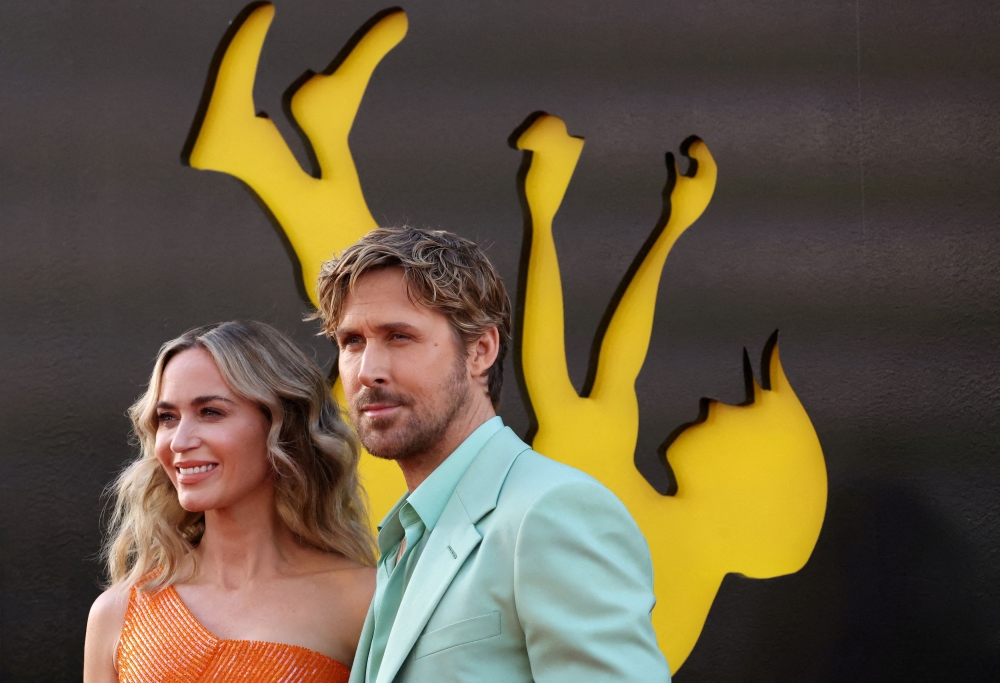 Cast members Emily Blunt and Ryan Gosling attend a premiere for the film 