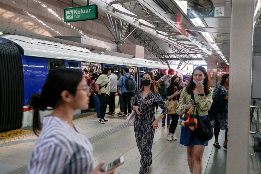 Workers pictured arriving at KL Sentral via the LRT, Bangsar, April 20, 2024. — Picture by Sayuti Zainudin 