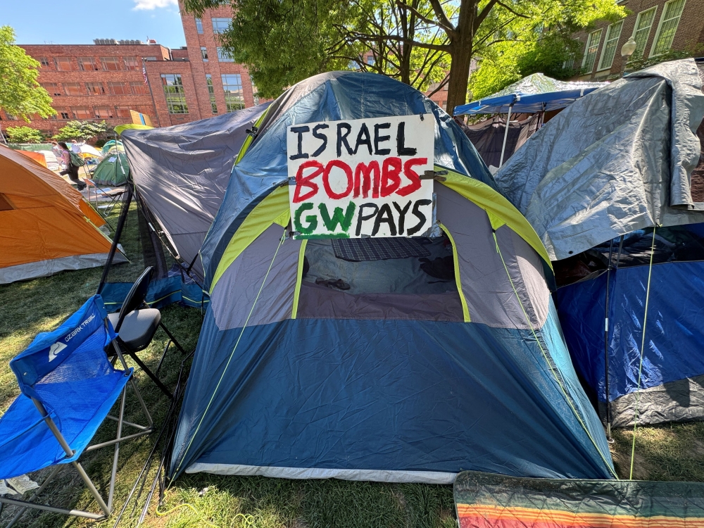 A sign adorns a tent at a protest encampment in support of Palestinians in Gaza, as student activists join campuses across the United States in a call on their universities to divest financial ties from Israel, in University Yard at George Washington University in Washington May 1, 2024. — Reuters pic