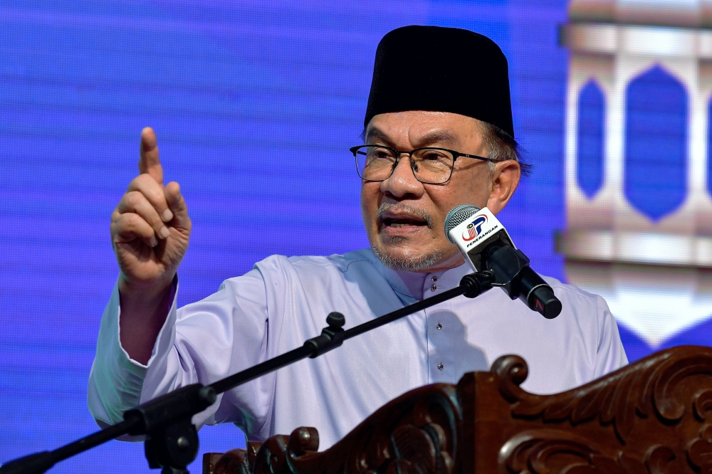 Prime Minister Datuk Seri Anwar Ibrahim speaks during the Kelantan-level 2024 Madani Aidilfitri Celebration at RTC Tunjong in Kota Baru May 2, 2024. ― Bernama pic