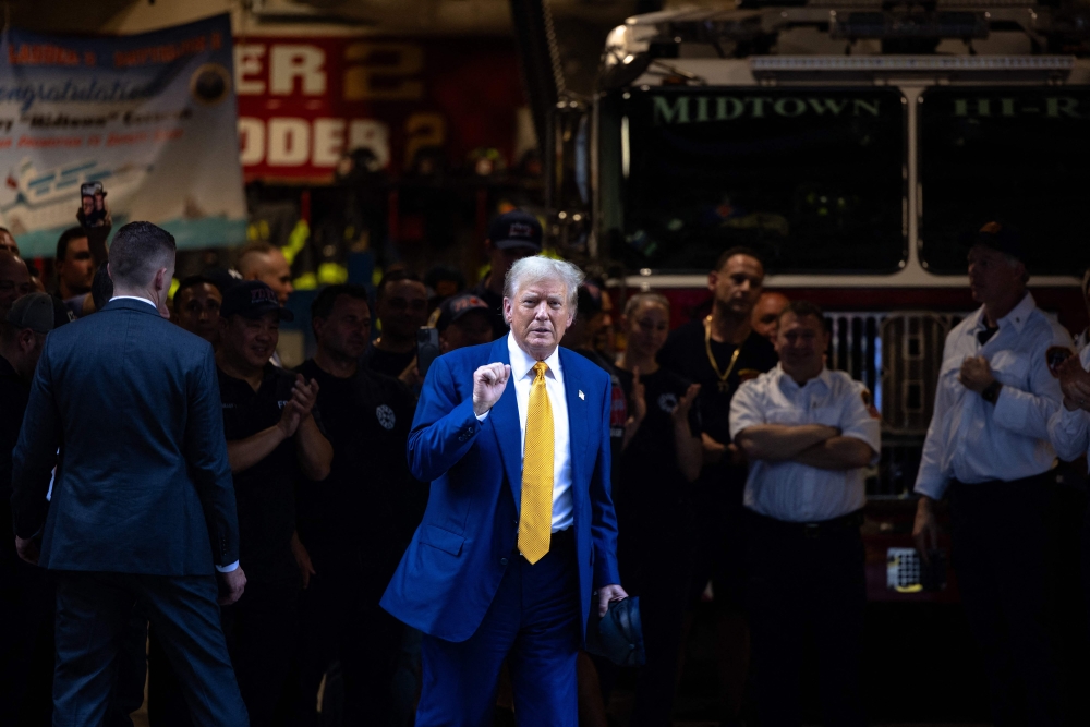 Donald Trump was facing a backlash yesterday after declining to pledge he will accept the results of the 2024 presidential election if he loses, as he repeated his false claims that he was cheated in the 2020 vote. — AFP pic